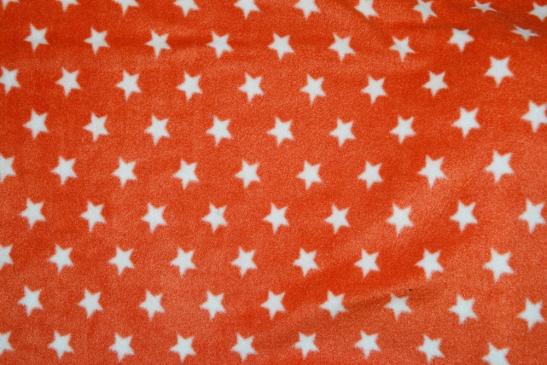 Fleece orange mit Sternen